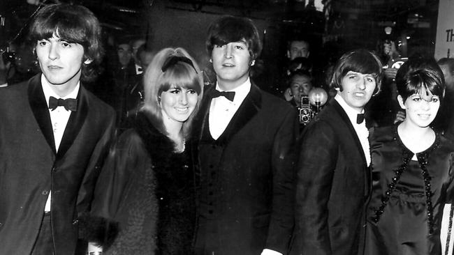 John Lennon with his first wife Cynthia (centre), George Harrison and Ringo Starr (right) with his wife Maureen in 1968.