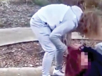 A helpless teen is bashed in a playground while another films. Picture: Instagram