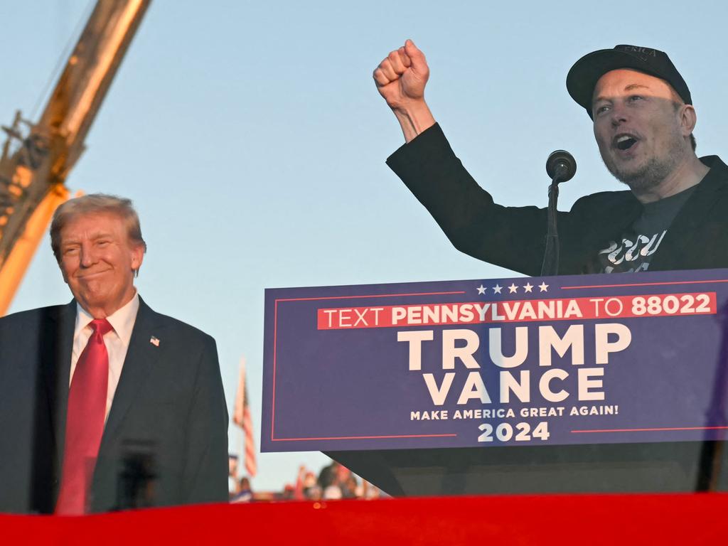 Musk onstage with Mr Trump during a campaign rally in Pennsylvania. Picture: Jim Watson/AFP