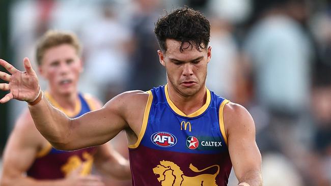 BRISBANE, AUSTRALIA - FEBRUARY 22: Cam Rayner of the Lions kicks during an AFL practice match between Brisbane Lions and Gold Coast Suns at Brighton Homes Arena on February 22, 2024 in Brisbane, Australia. (Photo by Chris Hyde/Getty Images)