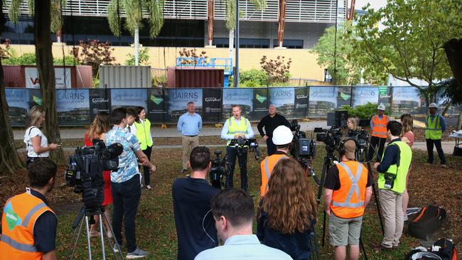 Premier Annastacia Palaszczuk and Housing and Public Works Minister Mick de Brenni on the ground during a press conference at the Cairns Convention Centre. Picture: PETER CARRUTHERS