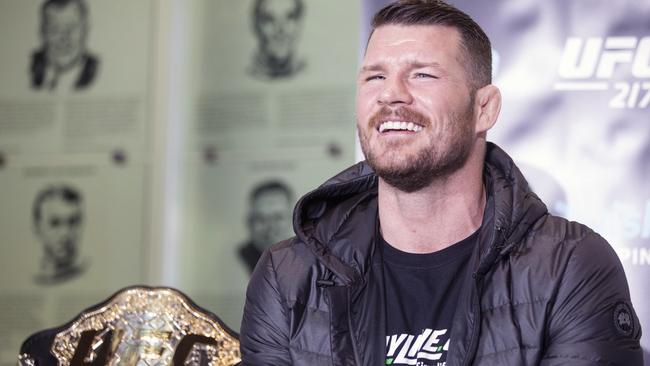 Britain's Michael Bisping smiles during a news conference.