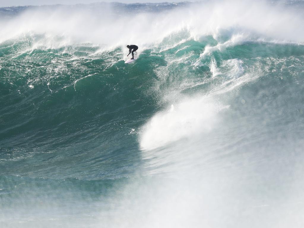 Daily telegraph May8/5/23. A massive swell has hit Sydney beaches causing Waverley council to fortify Bondi beach . Meanwhile crowds are gathering at south Coogee to watch.picture John Grainger