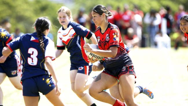 Action from 16 Girls Tonga v Philippines. Harmony Nines Rugby League. Picture: John Appleyard