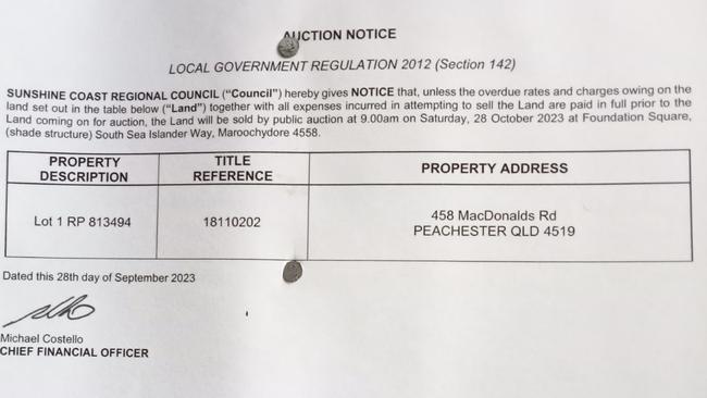 The auction notice put out the front of 458 Macdonalds Rd, Peachester.