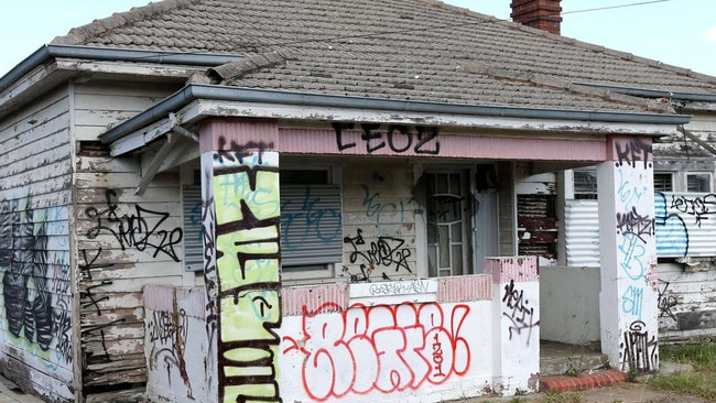 The graffitied and dilapidated Geelong West house.