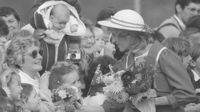 Princess Diana stops for a chat with admirers at Melbourne Airport in 1983.