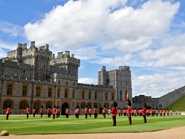 Guardsmen keep social distance as they stand in formation for a ceremony to mark Britain's Queen Elizabeth's official birthday at Windsor Castle. Picture: Getty