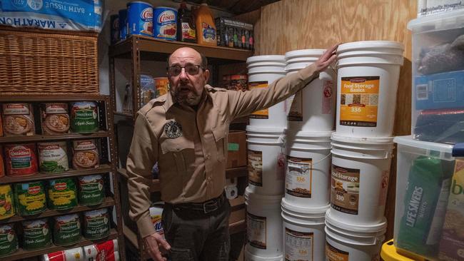 Fortitude Ranch Chief Operating Officer Steve Rene inside a storage room stacked with food in Mathias, West Virginia, where a group of US survivalists began preparing for the collapse of civilisation long before the arrival of coronavirus. Picture: AFP