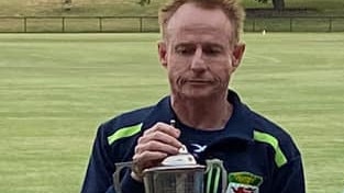 Pat Lennon with some Caulfield Cricket Club silverware. Picture: Supplied.