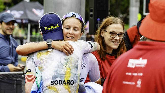 American triathlete Chelsea Sodoro wins the female Ironman 70.3 Tasmania in Hobart on Sunday 4th February 2024 and congratulates runner up Hanne De Vet. Picture: Linda Higginson
