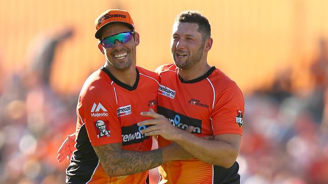 Mitchell Johnson and Tim Bresnan. (Photo by Paul Kane/Getty Images)