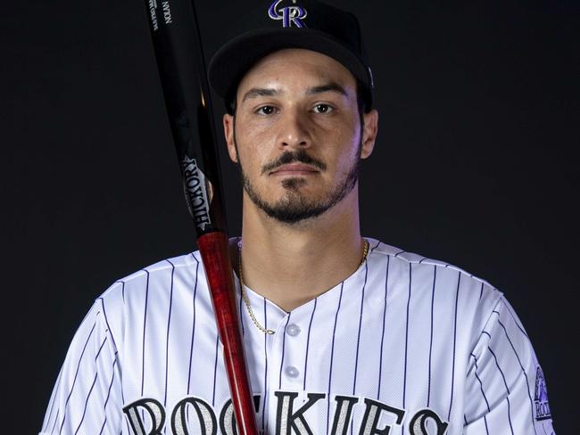 SCOTTSDALE, AZ - FEBRUARY 20: Nolan Arenado #28 of the Colorado Rockies poses during MLB Photo Day on February 20, 2019 at Salt River Fields at Talking Stick in Scottsdale, Arizona.   Justin Tafoya/Getty Images/AFP == FOR NEWSPAPERS, INTERNET, TELCOS & TELEVISION USE ONLY ==