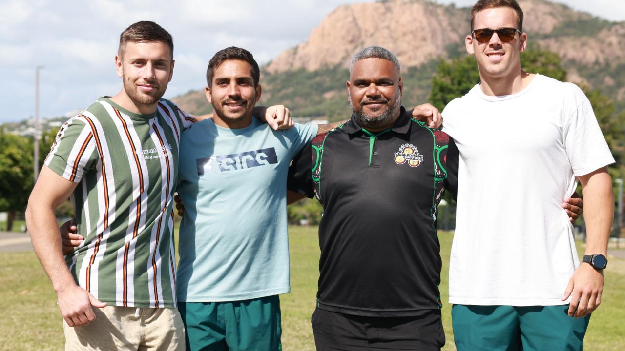 Longbottom with Australian Sevens players Josh Turner and Joe Pincus and local Indigenous elder Uncle Brenton Creed