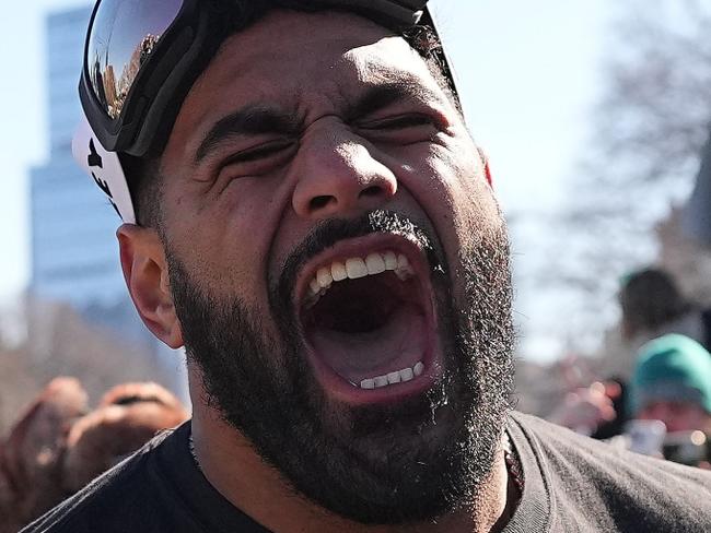 PHILADELPHIA, PENNSYLVANIA - FEBRUARY 14: Jordan Mailata #68 of the Philadelphia Eagles celebrates with fans during the Philadelphia Eagles Super Bowl Championship Parade on February 14, 2025 in Philadelphia, Pennsylvania. (Photo by Mitchell Leff/Getty Images) *** BESTPIX ***