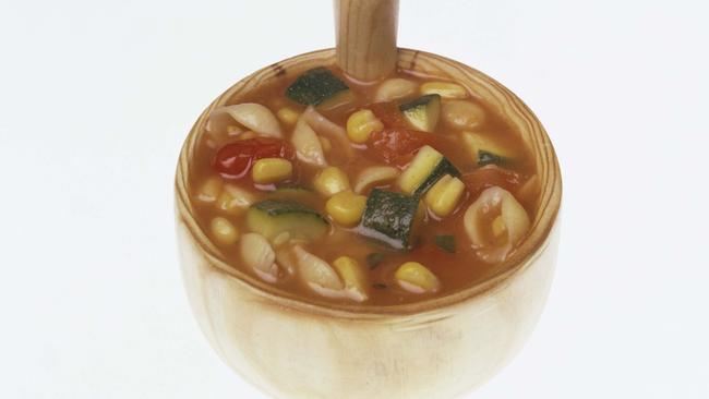 A ladle of minestrone.