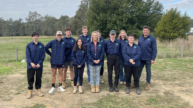 Lisa Mack (centre) and Brendan Ricci (right) with students from Yea High School.