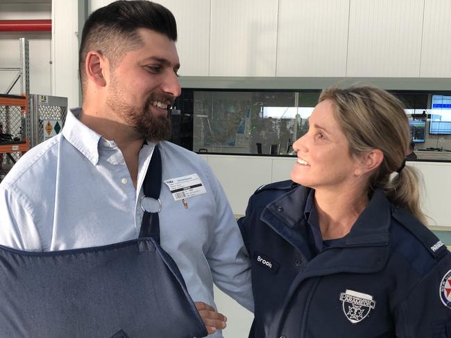 Nicholas Hanania with Brooke Cassell, the first paramedic to treat him at the scene. Picture: Lawrence Machado