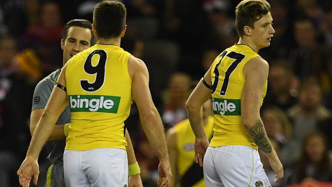 Cotchin was immediately reported by umpire Jacob Mollison and the Saints were awarded a 50m penalty after his gut punch on Lonie. Picture: AAP