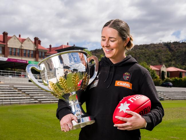 Jess Wuetschner with the AFLW Premiership Cup when it toured Tasmania last year. Picture Jonathan Laird