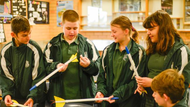 HAVING A BLAST: Year 8 Endeavour STEM class students from L-RCooper, Page, Elanor, Ciara and Sam prepare their rockets for a test flight.