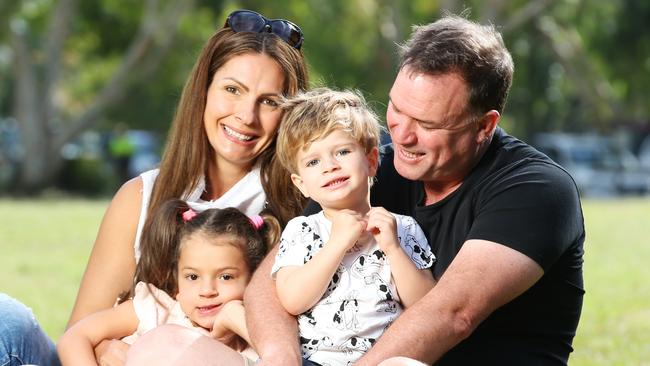 Natasha and Marc Kenney with children Amelie 4, and Xavier, 2, who both have  cochlear implants. Picture: Lachie Millard