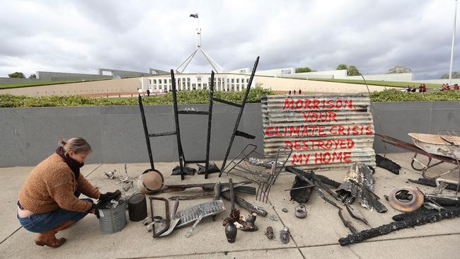 Bushfire Survivors for Climate Change members outside Parliament House in Canberra. Picture Kym Smith