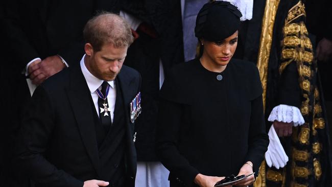 Prince Harry, Duke of Sussex and Meghan, Duchess of Sussex, leave after a service for the reception of Queen Elizabeth II's coffin at Westminster Hall in September. Picture: AFP