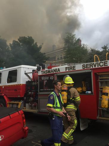 Crews attend a blaze at the mental health clinic in North Hobart. Picture: PATRICK BILLINGS