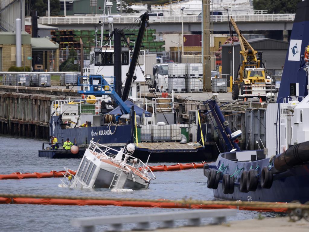 Sunken tug boats at Devonport wharf after being hit by the Goliath. Picture: Grant Viney