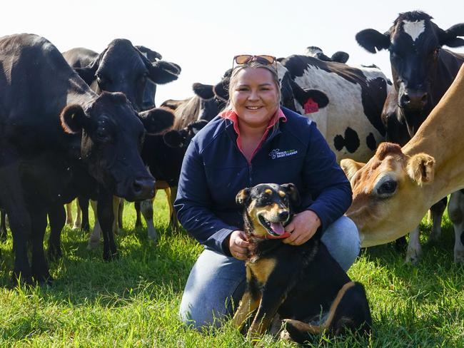 Dairy farmer Brooke Monk, from Kyabram, with her Kelpie Rose. Picture: Rachel Simmonds