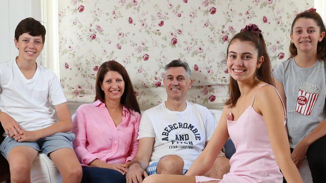 The Spark family say while private school fees are expensive, it’s a price they’re willing to pay for the better opportunities provided. Danielle and Brad are pictured with Laura, 15, Miranda, 12, and Jilian, 12. Picture: Liam Kidston