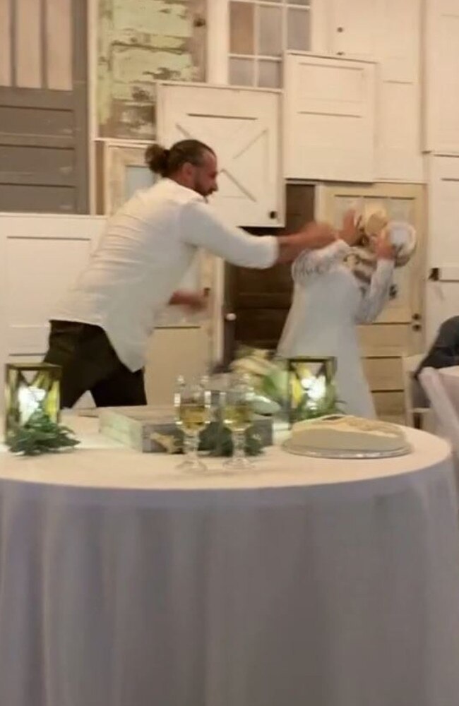 Bride Defends New Husband Over Aggressive Wedding Cake Throw | Video ...