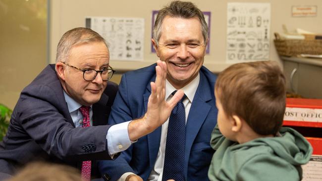 CANBERRA, AUSTRALIA - NewsWire Photos MARCH 23, 2023:  Prime Minister Anthony Albanese with Alexander Hawkes, 2 years old and Elyse Garth, 4 years old. Prime Minister Anthony Albanese with Ministers Jason Clare and Kristy McBain at a child care centre in Queanbeyan, NSW. Picture: NewsWire / Gary Ramage