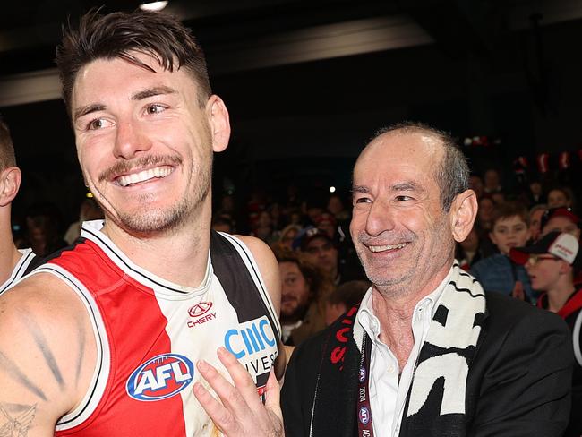 MELBOURNE, AUSTRALIA - JULY 07: Andrew Bassat, President of St Kilda Football Club celebrates with Josh Battle of the Saints during the round 17 AFL match between St Kilda Saints and Sydney Swans at Marvel Stadium, on July 07, 2024, in Melbourne, Australia. (Photo by Kelly Defina/Getty Images)