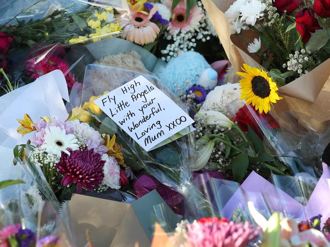 Floral tributes at Camp Hill where Hannah and her three children were murdered. Picture: Liam Kidston