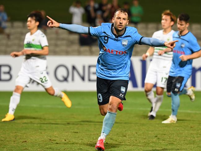 Adam Le Fondre of Sydney FC celebrates his penalty goal during Round 1 of the AFC Champions League match between the Sydney FC and the Jeonbuk Hyundai Motors FC at Netstrata Jubilee Stadium in Sydney, Wednesday, March 4, 2020. (AAP Image/Dean Lewins) NO ARCHIVING, EDITORIAL USE ONLY