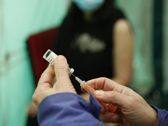 Dr Jacqueline Marshall prepares a dose of the AstraZeneca vaccine at a pop up vaccination unit in Kilburn in London, England. Picture: Getty Images