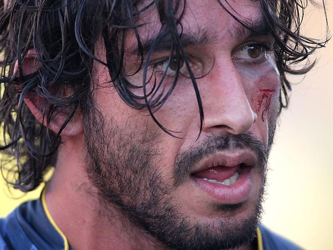 NEWCASTLE, AUSTRALIA - APRIL 25: Johnathan Thurston of the Cowboys leaves the ground after the victory over the Knights during the round eight NRL match between the Newcastle Knights and the North Queensland Cowboys at Hunter Stadium on April 25, 2015 in Newcastle, Australia. (Photo by Tony Feder/Getty Images)