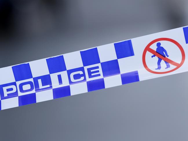 Generic image of police tape outside a crime scene on William Street in the Melbourne CBD on Wednesday, February 5, 2020. (AAP Image/James Ross) NO ARCHIVING