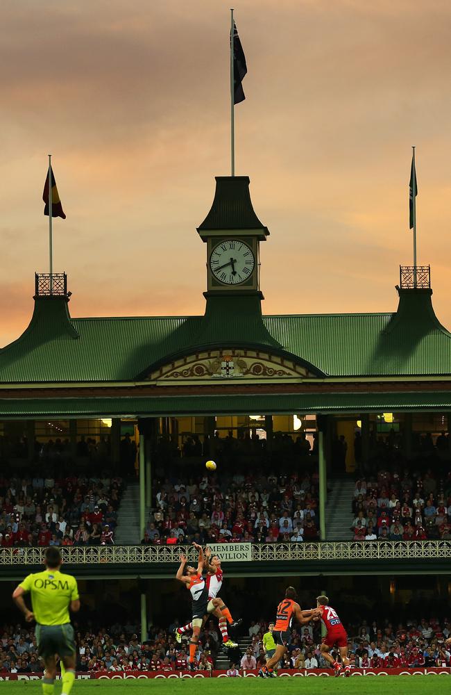 Giants ruckman Shane Mumford in action against Sydney’s Kurt Tippett in front of the SCG Members Pavilion. Picture: Phil Hillyard