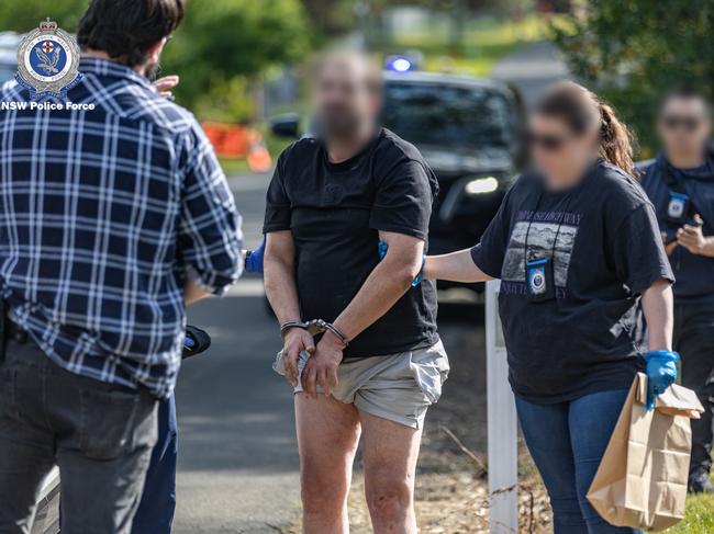 A DV offender arrested during a raid at Horsley Park. Picture: NSW Police