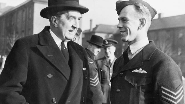 Stanley Bruce, High Commissioner for Australia in London, talking with Sergeant Len Fuller in 1941. Picture: Australian War Memorial