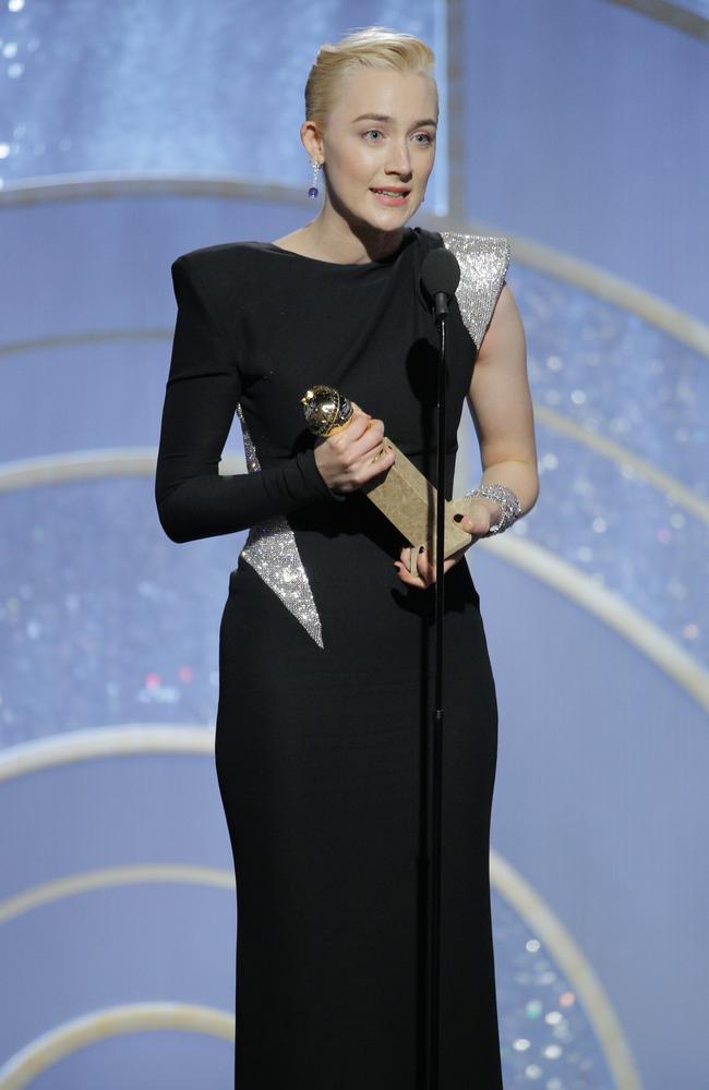 Saoirse Ronan accepts the award for Best Performance by an Actress in a Motion Picture Musical or Comedy for Lady Bird during the 75th Annual Golden Globe Awards. Picture: Getty