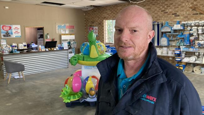 Poolwerx owner Conrad Reed reopened shortly after the floods but was still playing catch-up on about $80,000 of losses.