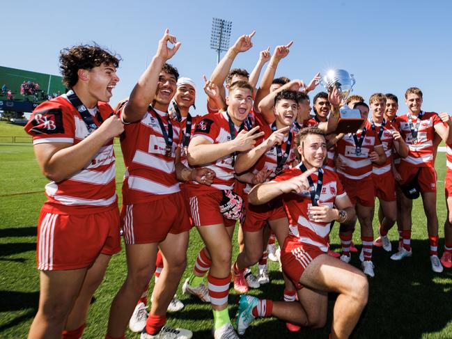 Palm Beach Currumbin celebrate winning the NRL Schoolboy Cup grand final against Kirwan SHS at Bokarina. Picture Lachie Millard