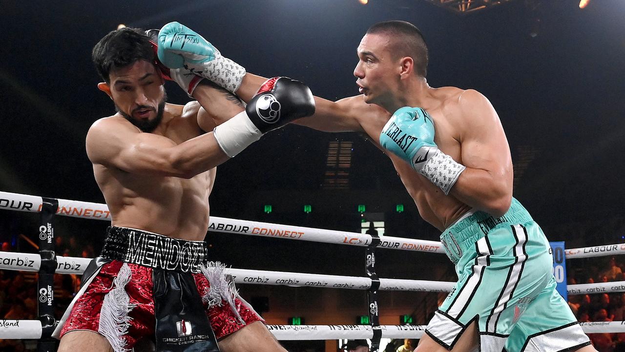 Tim Tszyu connects with a punch against Brian Mendoza during the WBO super-welterweight world title bout between Tim Tszyu and Brian Mendoza at Gold Coast Convention and Exhibition Centre on October 15, 2023 in Gold Coast, Australia. (Photo by Bradley Kanaris/Getty Images)