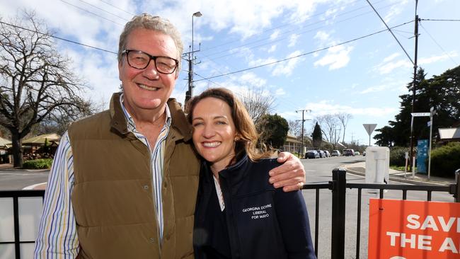 Liberal candidate Georgina Downer with her father, Alexander at a Mayo by-election pre-polling booth in Mount Barker. AAP Image/Kelly Barnes.