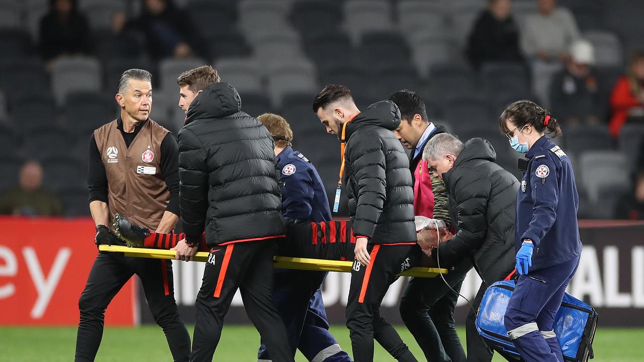 Wanderers forward Nicolai Muller is stretchered off the field. Picture: Mark Kolbe/Getty Images