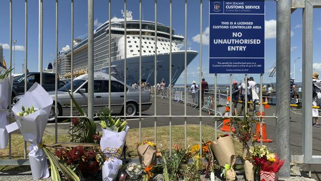 A makeshift memorial is seen in front of cruise ship Ovation of the Seas, in Tauranga, New Zealand. Picture: AP